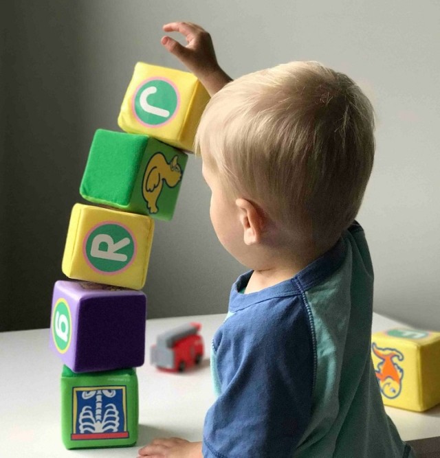 toddler with blocks